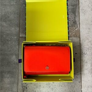 Like new Tory Burch patent leather orange cross body bag.